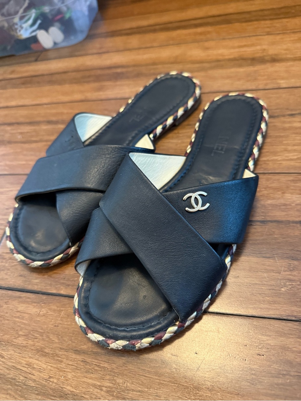 Chanel Black Leather Braided Trim Criss Cross CC Flat Slide
Sandals Size 41c